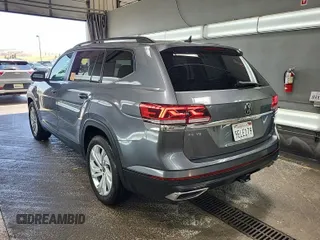 2023 Volkswagen Atlas SE z VIN 1V2HR2CA5PC526012, wystawiony jako IAAI lot #42796408 z przebiegiem 41 216 mil mil oraz . Historia ofert i sprzedaży dostępna na DreamBid. Obrazek 54.