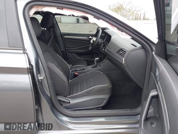 2024 Volkswagen Jetta Sport with VIN 3VWBM7BU6RM034053, listed as a IAAI auction lot 42425732 with 12,254 mi miles and . Bid and sale history available at DreamBid. Image 5.