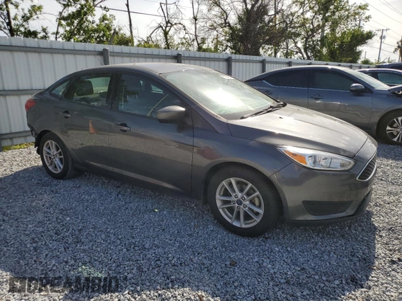 2018 Ford Focus SE with VIN 1FADP3F22JL304959, listed as a Copart auction lot 51994825 with 54,858 mi miles and Salvage Title. Bid and sale history available at DreamBid. Image 4.