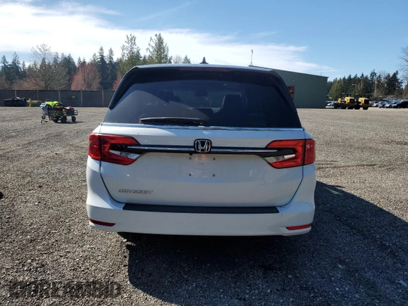 2021 Honda Odyssey EX-L with VIN 5FNRL6H79MB043486, listed as a Copart auction lot 51002515 with 47,998 mi miles and Salvage Title. Bid and sale history available at DreamBid. Image 6.