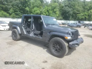 2021 Jeep Gladiator Willys with VIN 1C6HJTAG7ML572661, listed as a Copart auction lot 61172665 with 54,317 mi miles and Salvage title. Bid and sale history available at DreamBid. Image 4.