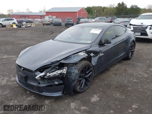 2021 Tesla Model S Long Range with VIN 5YJSA1E5XMF428519, listed as a IAAI auction lot 41926242 with 54,284 mi miles and . Bid and sale history available at DreamBid. Image 19.