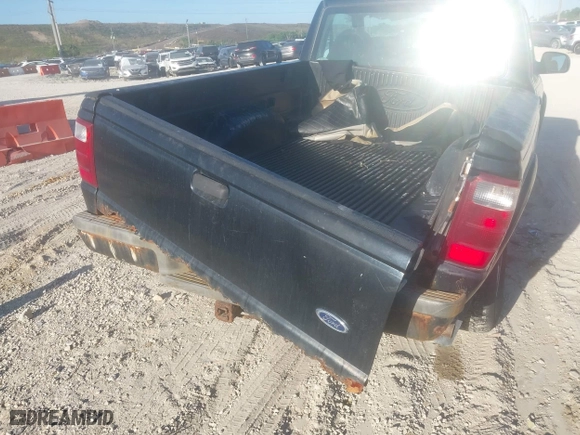 2003 Ford Ranger XL with VIN 1FTYR10U23PA44921, listed as a IAAI auction lot 41788023 with 128,034 mi miles. Bid and sale history available at carsss.com. Image 6.