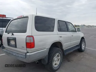 1997 Toyota 4Runner SR5 with VIN JT3GN86R0V0034665, listed as a IAAI auction lot 42316142 with 242,342 mi miles and . Bid and sale history available at DreamBid. Image 4.