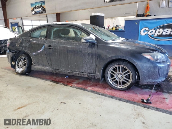 2010 Scion tC with VIN JTKDE3B75A0321007, listed as a Copart auction lot 42147955 with 91,389 mi miles and Salvage Title. Bid and sale history available at carsss.com. Image 4.