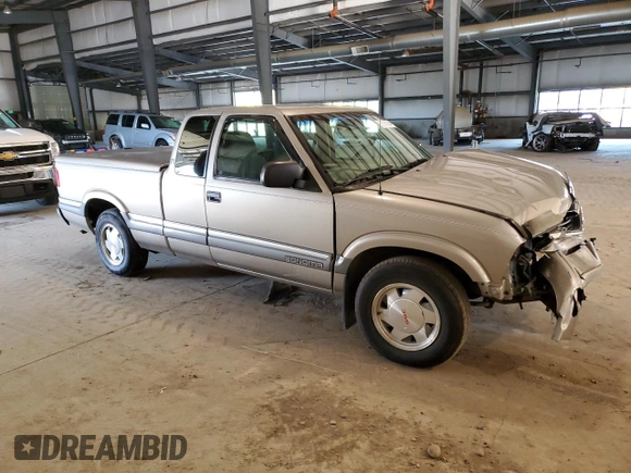 2000 GMC Sonoma SLS z VIN 1GTCS19W0Y8146125, wystawiony jako Copart lot #71576724 z przebiegiem 73 854 mil mil oraz Szkody całkowita. Historia ofert i sprzedaży dostępna na DreamBid. Obrazek 4.