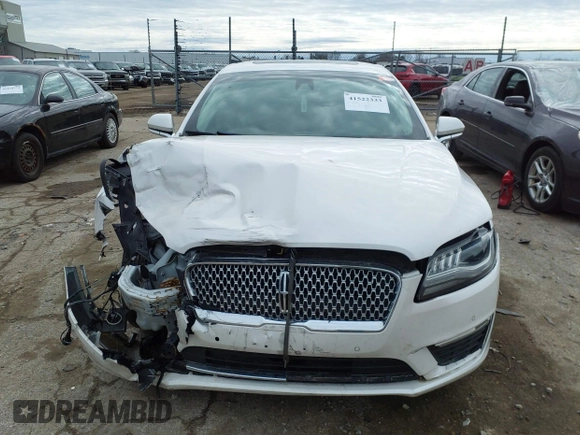 2019 Lincoln MKZ Hybrid Reserve II z VIN 3LN6L5MU1KR631351, wystawiony jako IAAI lot #41522333 z przebiegiem 82 839 mil mil oraz . Historia ofert i sprzedaży dostępna na DreamBid. Obrazek 12.