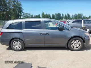 2012 Honda Odyssey LX с VIN 5FNRL5H23CB049703, выставлен на аукционе IAAI как лот 42467459 с пробегом 96 247 миль миль и . История ставок и продаж доступна на DreamBid. Изображение 13.