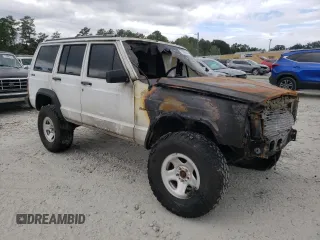 1992 Jeep Cherokee SE with VIN 1J4FJ28S1NL154354, listed as a Copart auction lot 71081634 with 0 mi miles and Salvage Title. Bid and sale history available at carsss.com. Image 4.