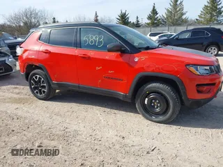 2020 Jeep Compass Trailhawk with VIN 3C4NJDDB2LT142394, listed as a IAAI auction lot 42055893 with 54,490 mi miles and . Bid and sale history available at carsss.com. Image 1.