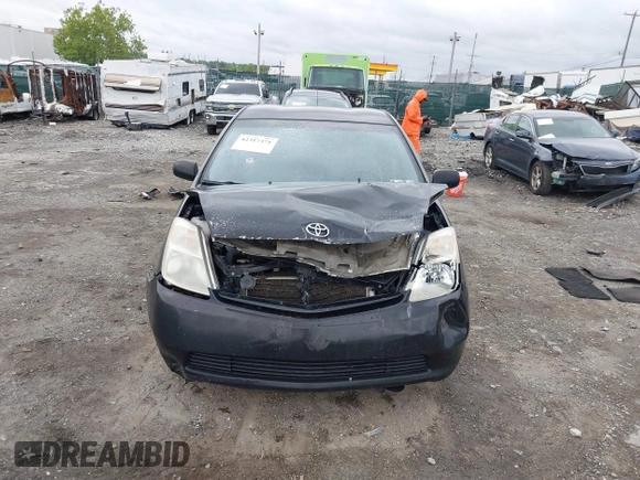 2005 Toyota Prius z VIN JTDKB20U253039812, wystawiony jako IAAI lot #42317371 z przebiegiem 281 142 mil mil oraz . Historia ofert i sprzedaży dostępna na DreamBid. Obrazek 13.