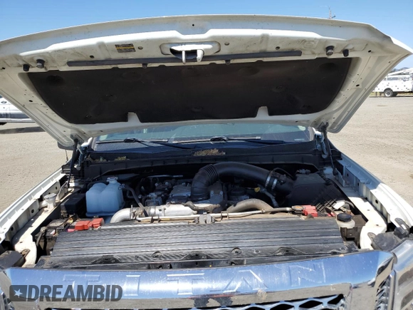 2017 Nissan Titan Pro-4X z VIN 1N6BA1F40HN559615, wystawiony jako Copart lot #57636455 z przebiegiem 99 803 mil mil oraz Szkoda całkowita • Salvage title. Historia ofert i sprzedaży dostępna na DreamBid. Obrazek 11.