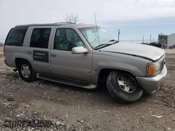 1999 GMC Denali with VIN 1GKEK13R0XR915053, listed as a Copart auction lot 49241145 with 2,664,121 mi miles and Salvage Title. Bid and sale history available at carsss.com. Image 4.