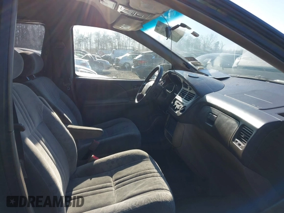 2001 Toyota Sienna LE z VIN 4T3ZF13C51U324527, wystawiony jako IAAI lot #41622465 z przebiegiem 145 450 mil mil oraz . Historia ofert i sprzedaży dostępna na DreamBid. Obrazek 5.