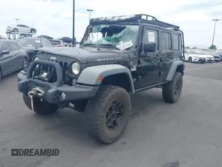 2014 Jeep Wrangler Unlimited Rubicon with VIN 1C4BJWFGXEL172622, listed as a IAAI auction lot 41782796 with 67,594 mi miles. Bid and sale history available at carsss.com. Image 2.
