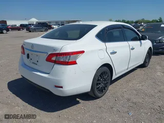 2015 Nissan Sentra S with VIN 3N1AB7AP1FY275638, listed as a IAAI auction lot 42013524 with 75,312 mi miles. Bid and sale history available at carsss.com. Image 4.