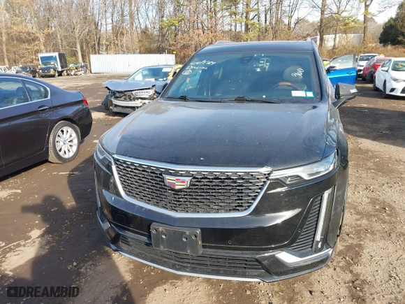 2023 Cadillac XT6 Luxury with VIN 1GYKPBR41PZ136918, listed as a IAAI auction lot 41417724 with 57,949 mi miles. Bid and sale history available at carsss.com. Image 12.