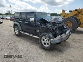 2012 Jeep Wrangler Unlimited Sport z VIN 1C4BJWDG4CL243538, wystawiony jako Copart lot #58826675 z przebiegiem 126 646 mil mil oraz Szkoda całkowita • Salvage title. Historia ofert i sprzedaży dostępna na DreamBid. Obrazek 4.