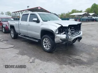 2018 GMC Sierra 1500 SLT with VIN 3GTU2NEC2JG285972, listed as a IAAI auction lot 42023126 with 168,340 mi miles and . Bid and sale history available at DreamBid. Image 1.