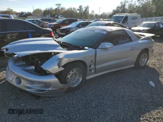 2002 Pontiac Firebird Formula z VIN 2G2FV22G822152907, wystawiony jako Copart lot #87459634 z przebiegiem 64 858 mil mil oraz Szkody całkowita. Historia ofert i sprzedaży dostępna na DreamBid. Obrazek 1.
