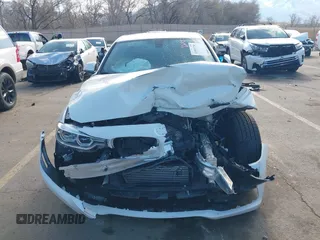 2018 BMW 3 Series 320i xDrive with VIN WBA8A3C59JA505164, listed as a IAAI auction lot 41959756 with 63,395 mi miles and . Bid and sale history available at DreamBid. Image 13.