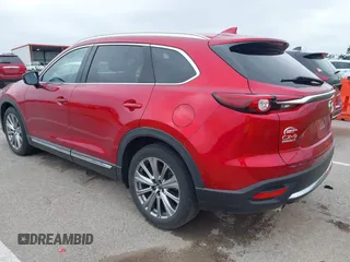 2021 Mazda CX-9 Signature with VIN JM3TCBEY9M0511928, listed as a IAAI auction lot 42231925 with 26,367 mi miles and . Bid and sale history available at DreamBid. Image 3.