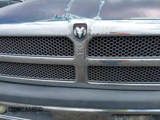 1999 Dodge 1500 z VIN 1B7HC13Z6XJ525580, wystawiony jako IAAI lot #41755940 z przebiegiem 417 640 mil mil oraz . Historia ofert i sprzedaży dostępna na DreamBid. Obrazek 6.