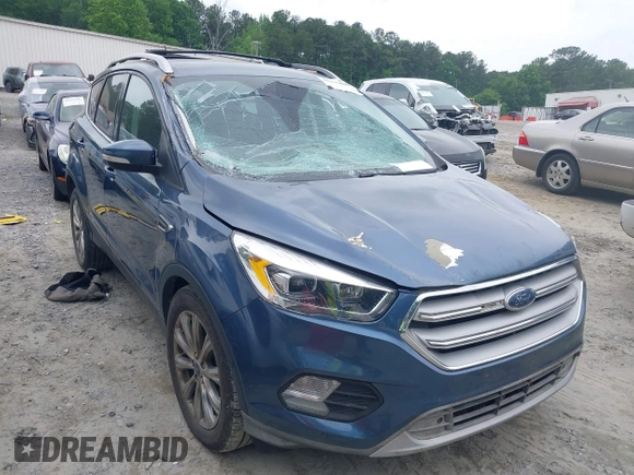 2018 Ford Escape Titanium with VIN 1FMCU0J99JUA12717, listed as a IAAI auction lot 42237509 with 123,896 mi miles and . Bid and sale history available at DreamBid. Image 1.
