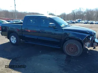 2005 Dodge Dakota SLT z VIN 1D7HW48N25S178373, wystawiony jako IAAI lot #41815561 z przebiegiem 148 112 mil mil oraz . Historia ofert i sprzedaży dostępna na DreamBid. Obrazek 18.