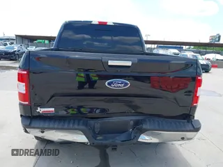 2019 Ford F-150 XL with VIN 1FTEW1E59KKE90346, listed as a IAAI auction lot 42188308 with 130,992 mi miles and . Bid and sale history available at DreamBid. Image 6.