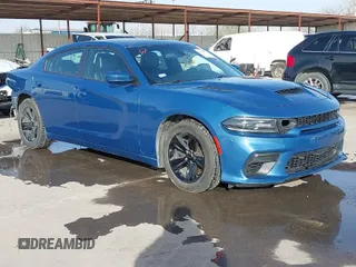 2021 Dodge Charger SXT with VIN 2C3CDXBG1MH518113, listed as a IAAI auction lot 41836023 with 73,091 mi miles. Bid and sale history available at carsss.com. Image 1.
