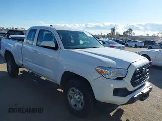 2018 Toyota Tacoma SR with VIN 5TFRX5GNXJX106322, listed as a IAAI auction lot 41751392 with 65,603 mi miles and . Bid and sale history available at carsss.com. Image 1.
