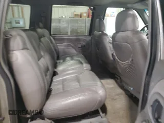 1999 Chevrolet Suburban z VIN 3GNFK16R4XG250550, wystawiony jako Copart lot #51941515 z przebiegiem 202 667 mil mil oraz Szkoda całkowita • Salvage title. Historia ofert i sprzedaży dostępna na DreamBid. Obrazek 11.