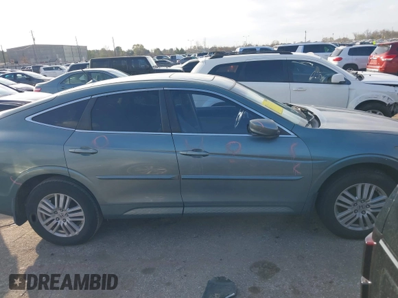 2012 Honda Crosstour EX-L z VIN 5J6TF3H54CL006023, wystawiony jako IAAI lot #41240250 z przebiegiem 117 809 mil mil oraz . Historia ofert i sprzedaży dostępna na DreamBid. Obrazek 13.