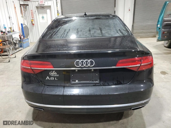 2016 Audi A8 L 3.0T with VIN WAU34AFD4GN013345, listed as a Copart auction lot 85239954 with 127,491 mi miles and Salvage Title. Bid and sale history available at carsss.com. Image 6.