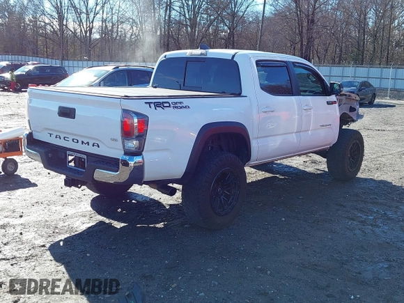 2020 Toyota Tacoma SR5 with VIN 3TMAZ5CN4LM132002, listed as a IAAI auction lot 41224844 with 55,000 mi miles and . Bid and sale history available at DreamBid. Image 4.