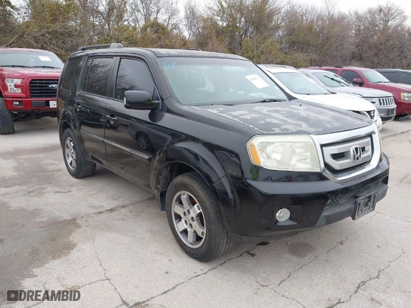 2010 Honda Pilot Touring with VIN 5FNYF4H89AB034007, listed as a IAAI auction lot 41494712 with 318,710 mi miles. Bid and sale history available at carsss.com. Image 1.