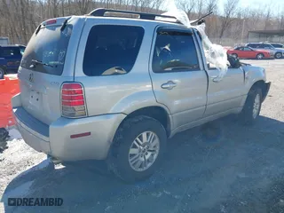 2007 Mercury Mariner Luxury with VIN 4M2YU91157KJ13700, listed as a IAAI auction lot 41616980 with 242,497 mi miles. Bid and sale history available at carsss.com. Image 4.