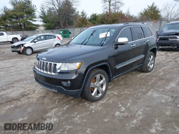 2013 Jeep Grand Cherokee Overland with VIN 1C4RJECG5DC621149, listed as a IAAI auction lot 41255140 with 157,355 mi miles. Bid and sale history available at carsss.com. Image 17.