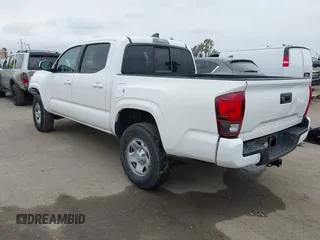 2021 Toyota Tacoma SR with VIN 3TYAX5GNXMT032184, listed as a IAAI auction lot 42204429 with 60,295 mi miles and . Bid and sale history available at DreamBid. Image 3.