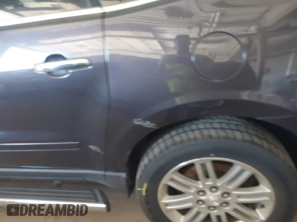 2015 Chevrolet Traverse LT with VIN 1GNKRGKDXFJ371359, listed as a IAAI auction lot 42691574 with Not provided miles and . Bid and sale history available at DreamBid. Image 6.