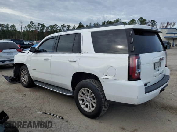 2015 GMC Yukon SLE with VIN 1GKS2AKCXFR744083, listed as a Copart auction lot 82003234 with 150,926 mi miles and Salvage Title. Bid and sale history available at carsss.com. Image 2.