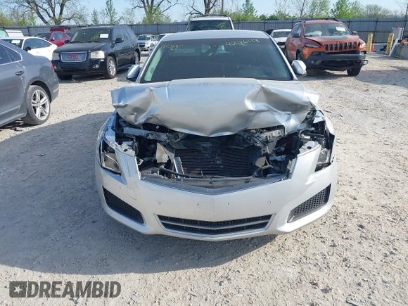 2013 Cadillac ATS Luxury z VIN 1G6AB5RX0D0155670, wystawiony jako IAAI lot #42076118 z przebiegiem 117 084 mil mil oraz . Historia ofert i sprzedaży dostępna na DreamBid. Obrazek 6.