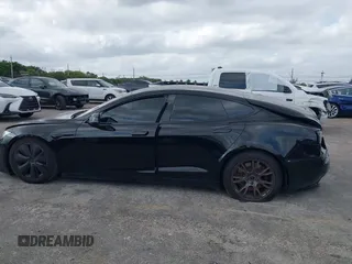 2023 Tesla Model S with VIN 5YJSA1E53PF510757, listed as a IAAI auction lot 42075624 with Not provided miles and . Bid and sale history available at DreamBid. Image 15.