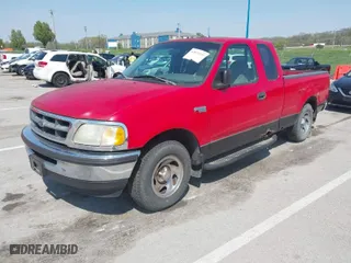 1998 Ford F-150 Standard with VIN 1FTZX1729WKB42151, listed as a IAAI auction lot 42074530 with 174,690 mi miles. Bid and sale history available at carsss.com. Image 2.
