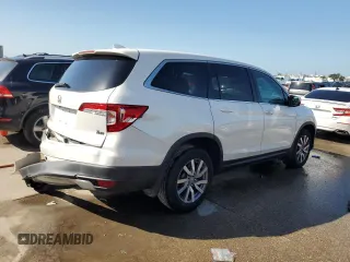 2021 Honda Pilot EX-L with VIN 5FNYF5H54MB045464, listed as a Copart auction lot 63412425 with 60,666 mi miles and Salvage title. Bid and sale history available at DreamBid. Image 3.