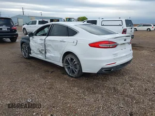2019 Ford Fusion Titanium with VIN 3FA6P0D93KR138574, listed as a IAAI auction lot 41967094 with 118,297 mi miles. Bid and sale history available at carsss.com. Image 3.