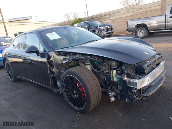 2012 Porsche Panamera Turbo with VIN WP0AC2A79CL090481, listed as a IAAI auction lot 41954044 with 59,433 mi miles. Bid and sale history available at carsss.com. Image 14.