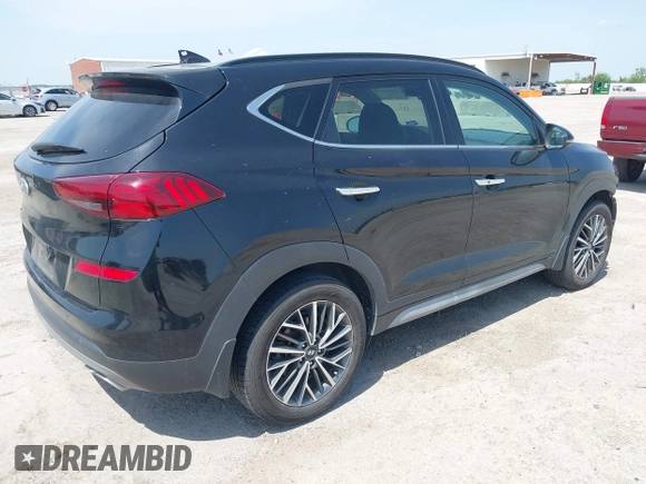 2021 Hyundai Tucson Ultimate with VIN KM8J33ALXMU289579, listed as a IAAI auction lot 42027719 with 95,989 mi miles and . Bid and sale history available at DreamBid. Image 4.