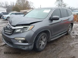 2017 Honda Pilot EX-L with VIN 5FNYF5H8XHB018480, listed as a IAAI auction lot 41049028 with 136,748 mi miles and . Bid and sale history available at DreamBid. Image 22.